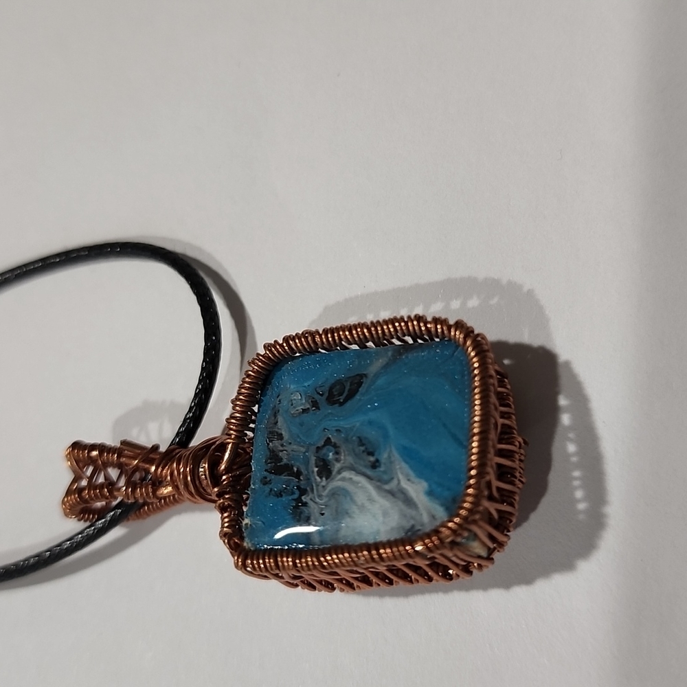NWOT, handcrafted, one of a kind altered scrabble pendant, with cord.